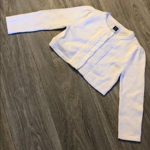 Janie and Jack shrug